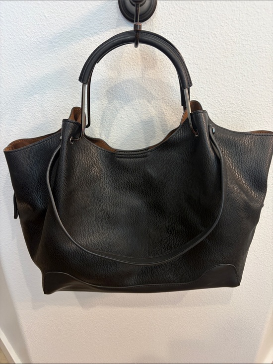 Sondra Roberts Handbags - Sondra Roberts Black faux leather Tote with Black Trim and Patterned Lining